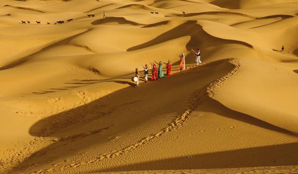 walking in the desert sand dunes